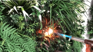 IFR polymers and surface-treated faux plants.